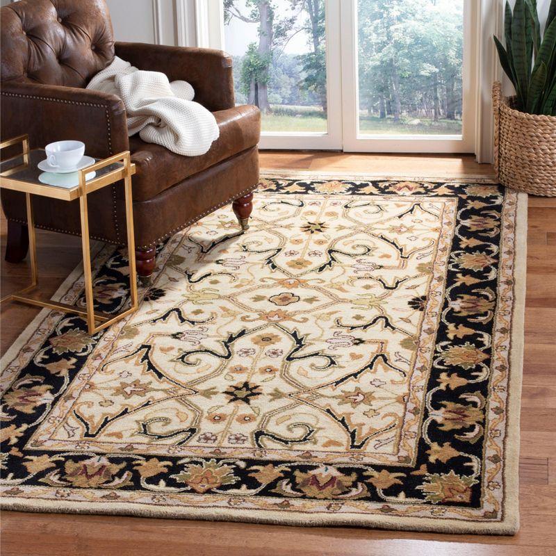 Heritage HG644 Hand Tufted Area Rug - Ivory/Black - 7'6"x9'6" - Safavieh.