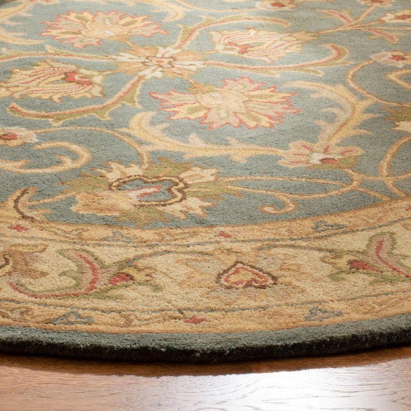 Heritage HG811 Hand Tufted Area Rug - Blue/Beige - 4'6"x6'6" Oval - Safavieh.