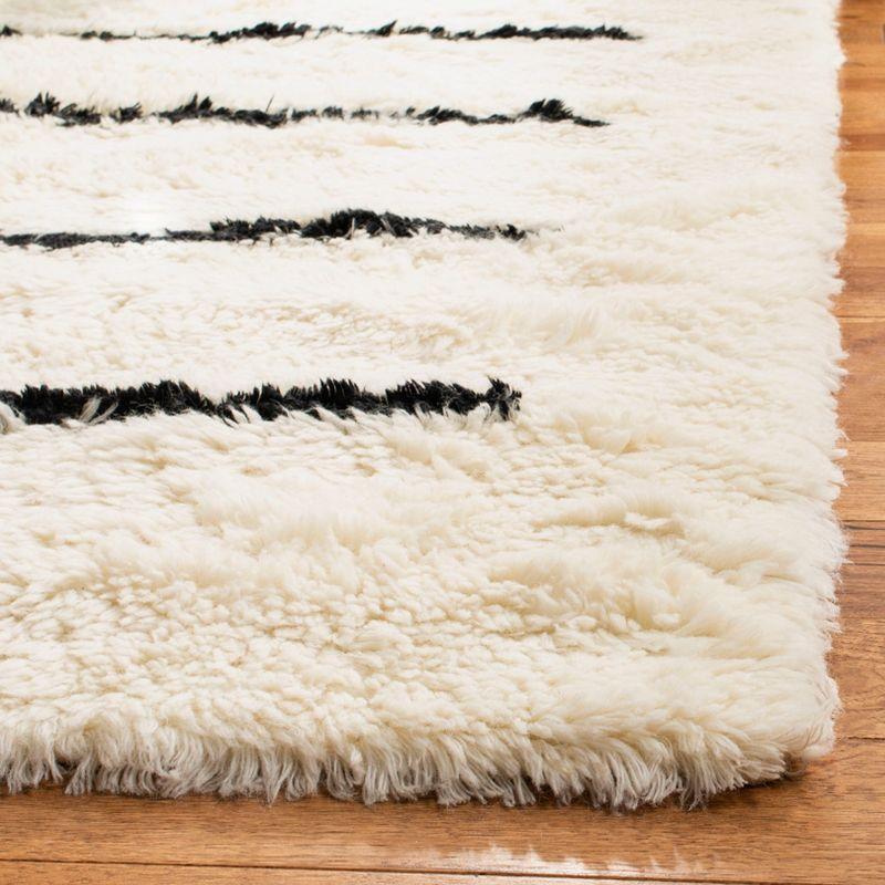 Elevated Black Hand-Knotted Pure Wool 9' x 12' Area Rug