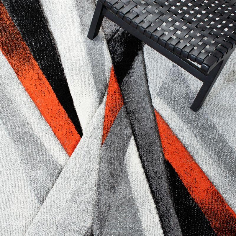 Hollywood HLW710 Machine Made Area Rug - 9'x12' - Grey/Orange - Safavieh