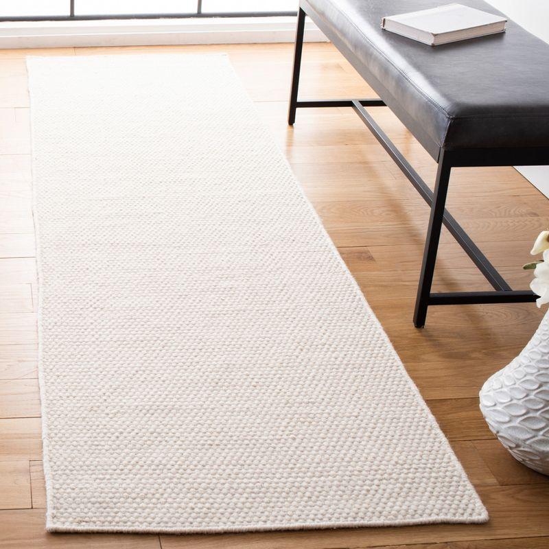 Opperman Hand Tufted Solid Color Rug