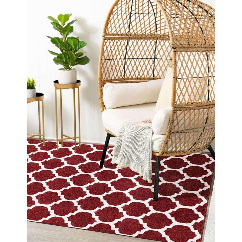 Red and Orange Synthetic Trellis Indoor Area Rug