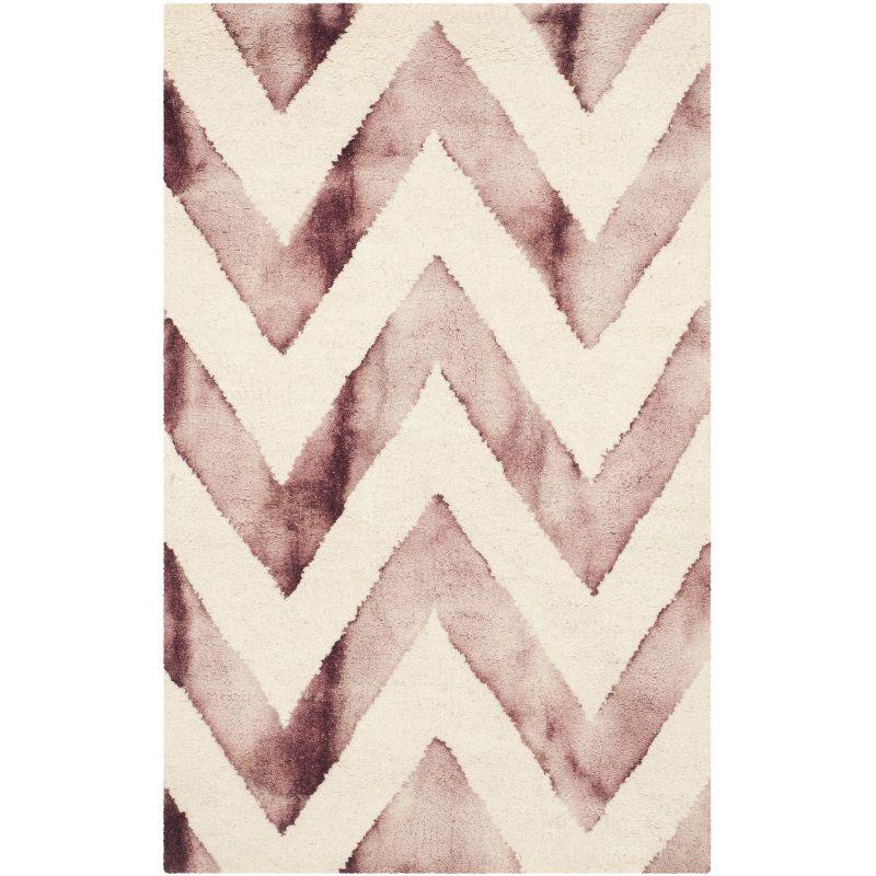 Hand-Tufted Ivory and Maroon Wool Area Rug - 24" x 4"