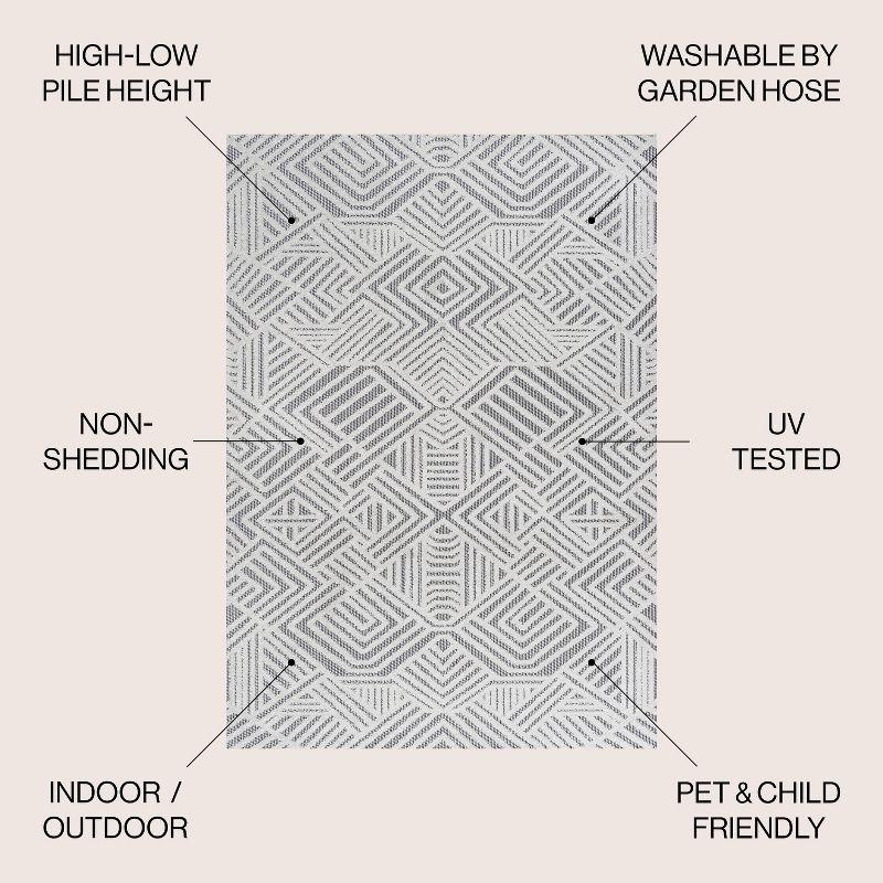 4'x6' Jordan High-Low Pile Art Deco Geometric Indoor/Outdoor Area Rug, White/Black - JONATHAN Y