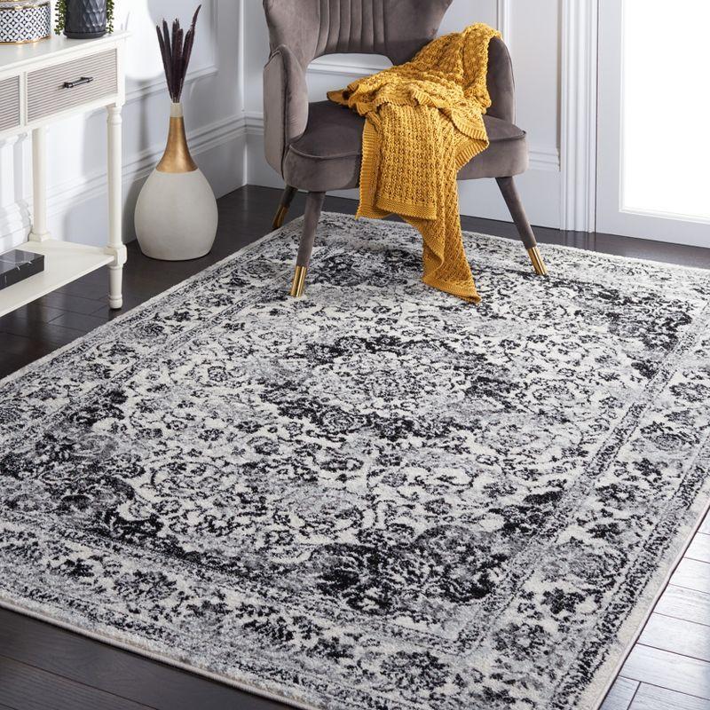 Ivory and Black Hand-Knotted Synthetic 8' x 10' Area Rug