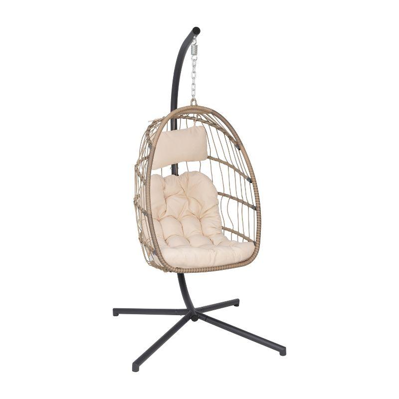 Emma and Oliver Foldable Hanging Egg Chair with Natural Woven Finish, Removable Cream Cushions, and Included Stand for Indoor and Outdoor Use