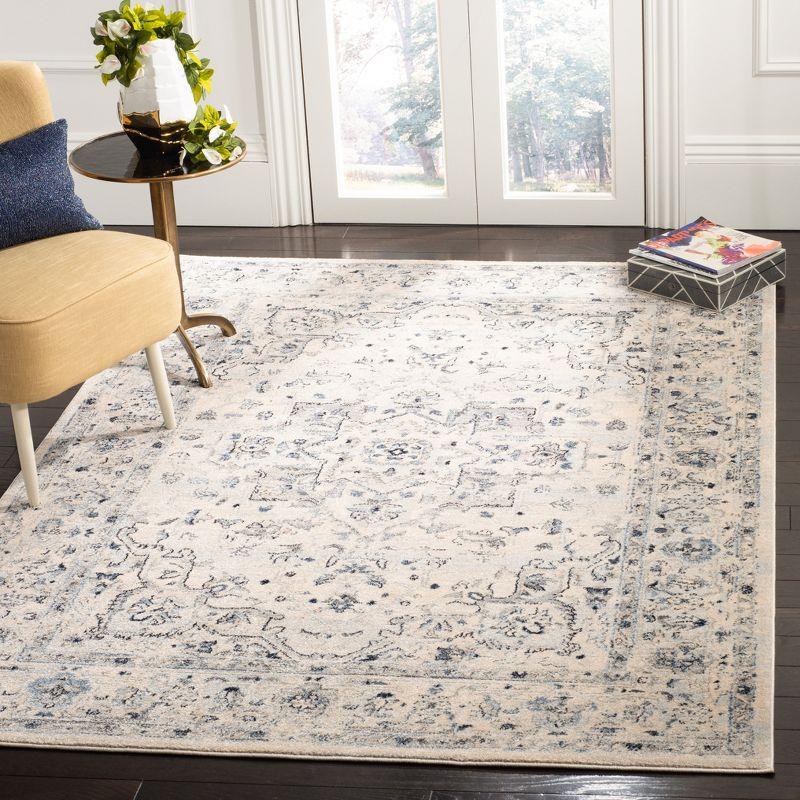 Ivory and Light Blue Synthetic 4' x 6' Hand-Knotted Area Rug