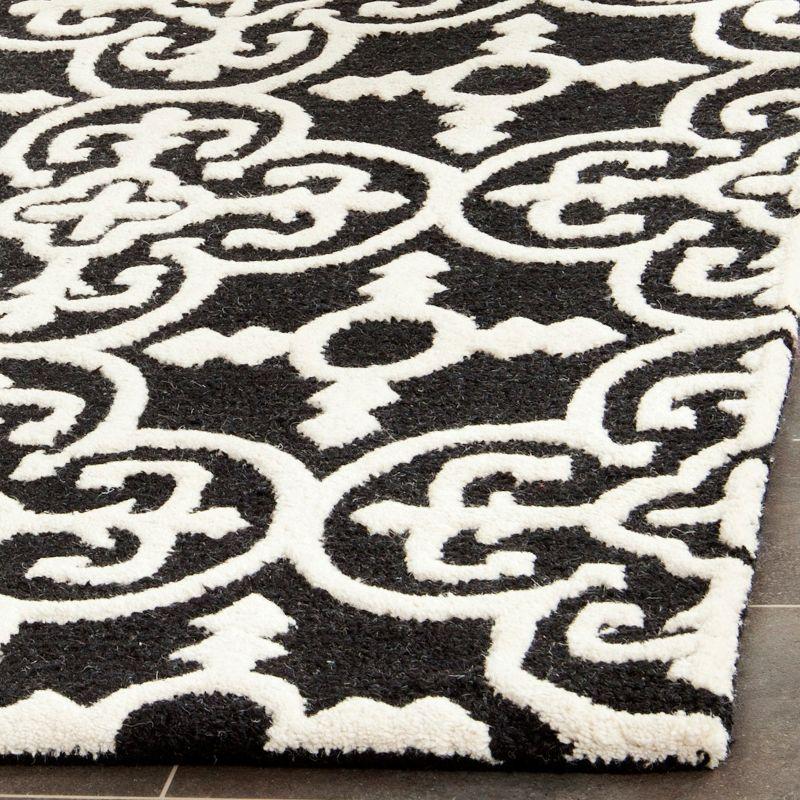 Cambridge CAM133 Hand Tufted Area Rug  - Safavieh