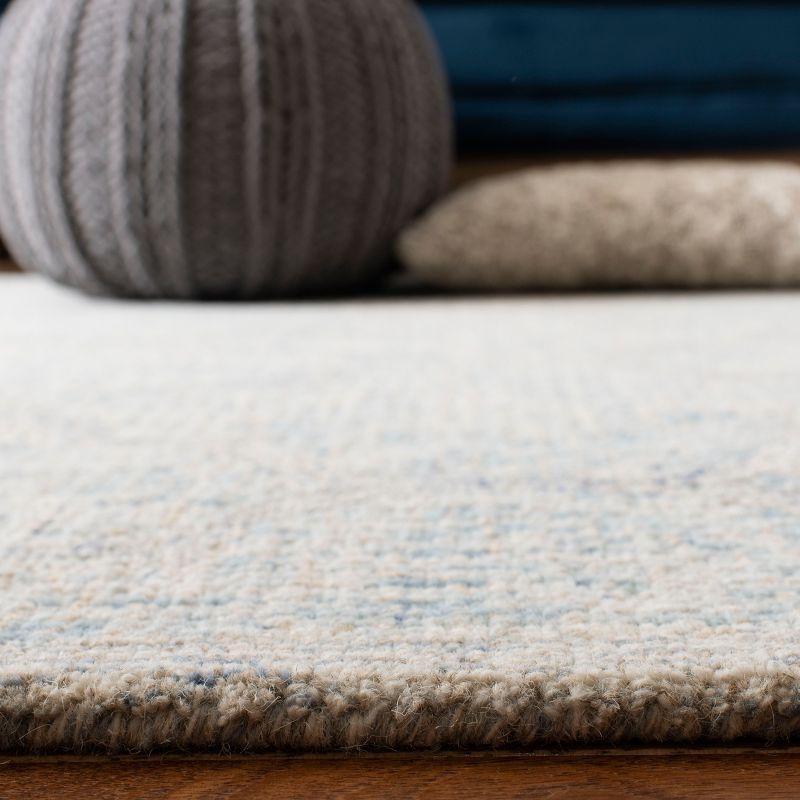 Abstract ABT474 Handmade Indoor Area Rug - Ivory/Light Blue - 6'x9' - Safavieh