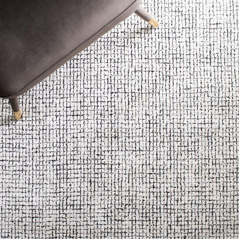 Handmade Abstract Ivory & Black Wool-Viscose 4' x 6' Area Rug