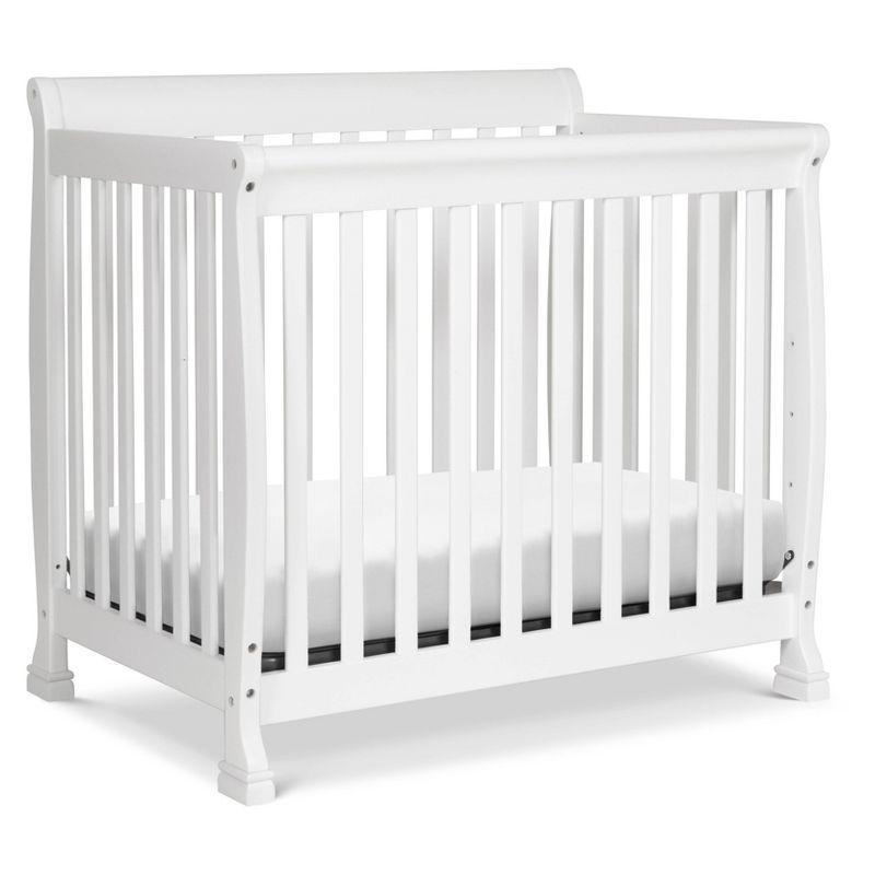 White Wooden 4-in-1 Convertible Mini Crib and Dresser Set