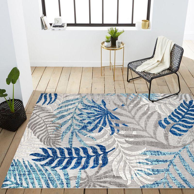 Tropics Palm Leaves Indoor/Outdoor Area Rug - JONATHAN Y