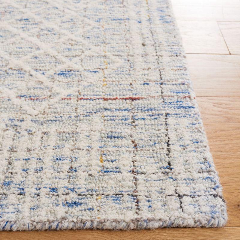 Blue and Ivory 4' x 6' Hand-Tufted Wool Area Rug