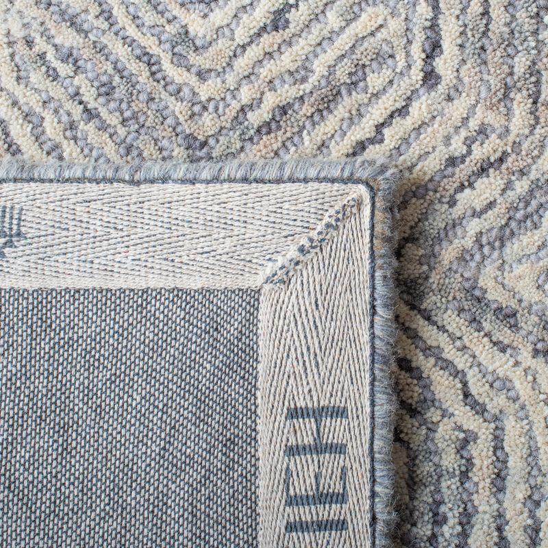 Ikat IKT506 Hand Tufted Area Rug - Silver - 9'x12' - Safavieh