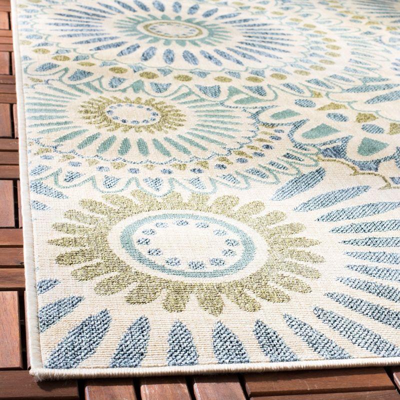 Cream and Chocolate Floral Synthetic Indoor/Outdoor Rug