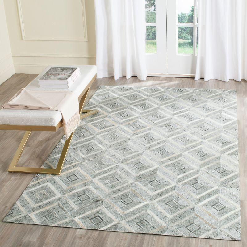 Ivory Geometric Hand-Knotted Cowhide Viscose Area Rug