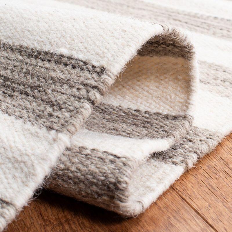Dhurries DHU575 Hand Woven Flat Weave Runner Rug  Brown / Ivory 2'-6" X 10' - Safavieh.