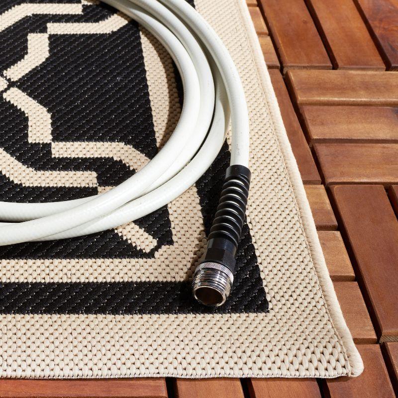 Elegant Black Synthetic 59" Rectangular Indoor/Outdoor Rug