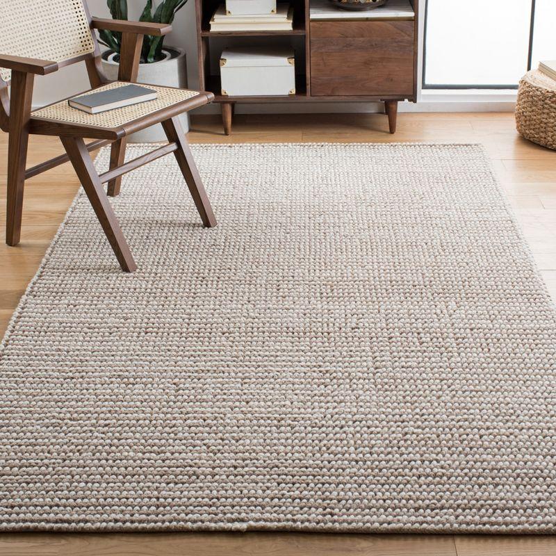 Ivory Handwoven Wool 3' x 5' Area Rug