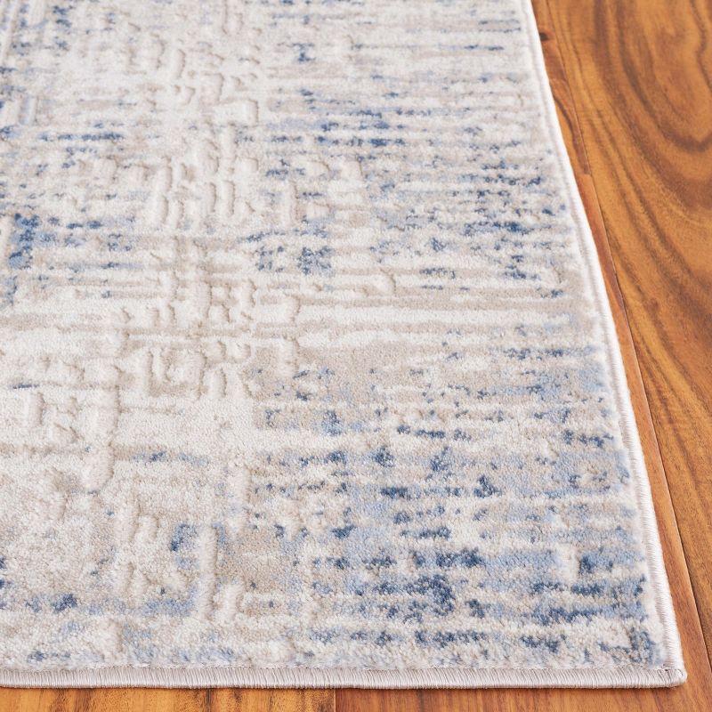 Ivory and Blue Synthetic Easy Care Area Rug