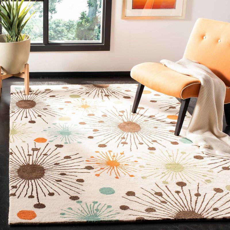 Soho SOH747 Hand Tufted Area Rug  - Safavieh