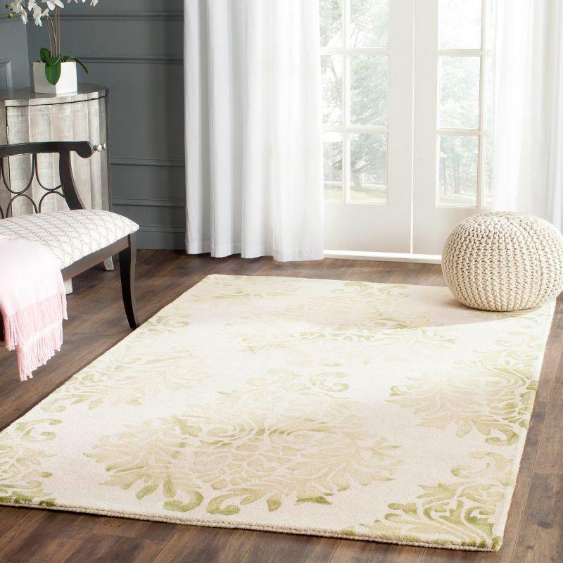 Beige and Green Hand-Tufted Wool 4' x 6' Area Rug