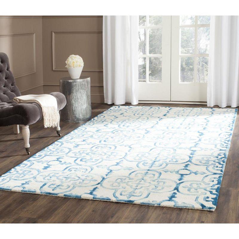 Ivory and Turquoise Hand-Tufted Wool 6' x 9' Area Rug