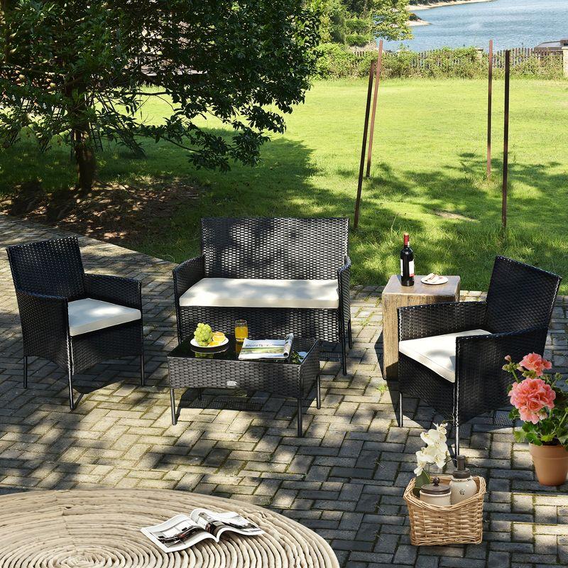 Costway 4PCS Patio Rattan Furniture Set Cushioned Sofa Coffee Table Backyard Porch White