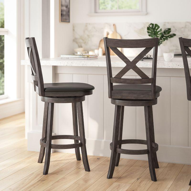 Merrick Lane 30" Gray Wash Walnut Classic Wooden Crossback Swivel Bar Height Pub Stool with Black Faux Leather Padded Seat and Integrated Footrest
