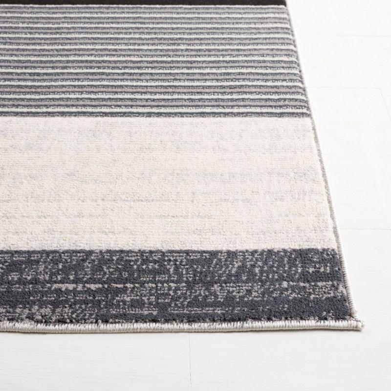 Odyssey ODY816 Power Loomed Area Rug  - Safavieh