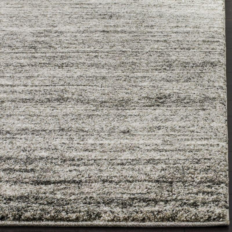 Ivory and Grey Abstract Synthetic Area Rug