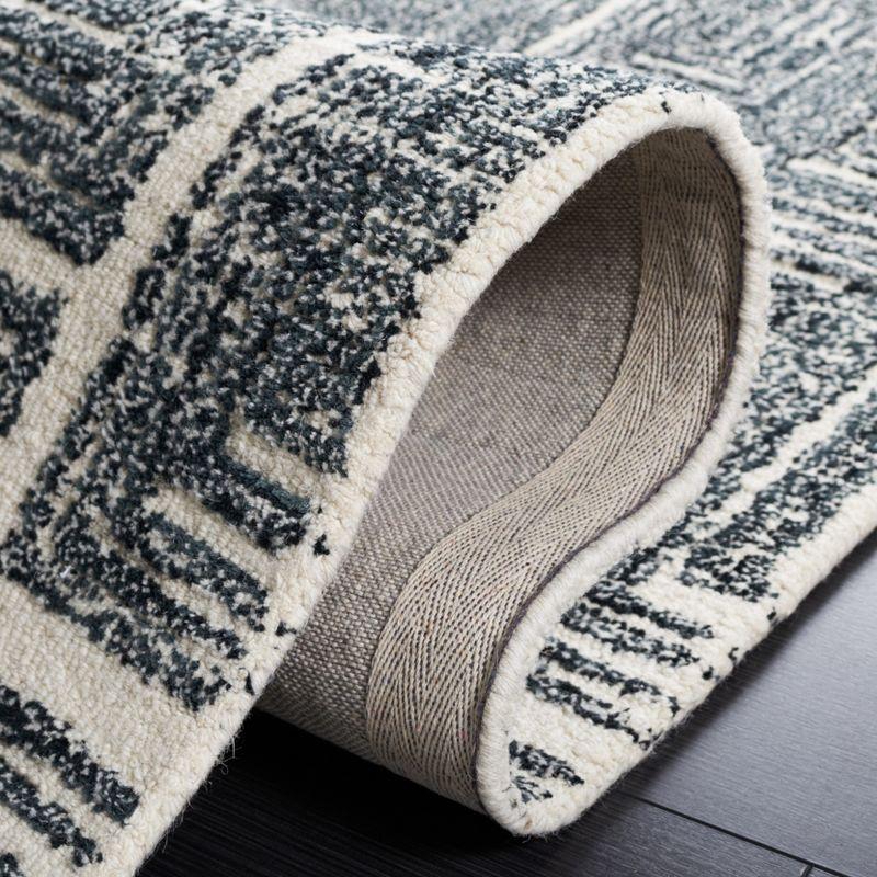Metro MET177 Hand Tufted Indoor Area Rug - Black/Ivory - 4'x6' - Safavieh