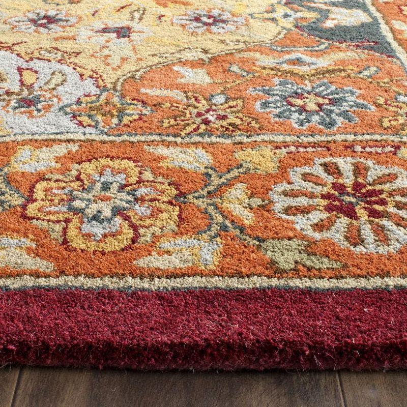 Handmade Multi/Red Wool 6' x 9' Tufted Area Rug