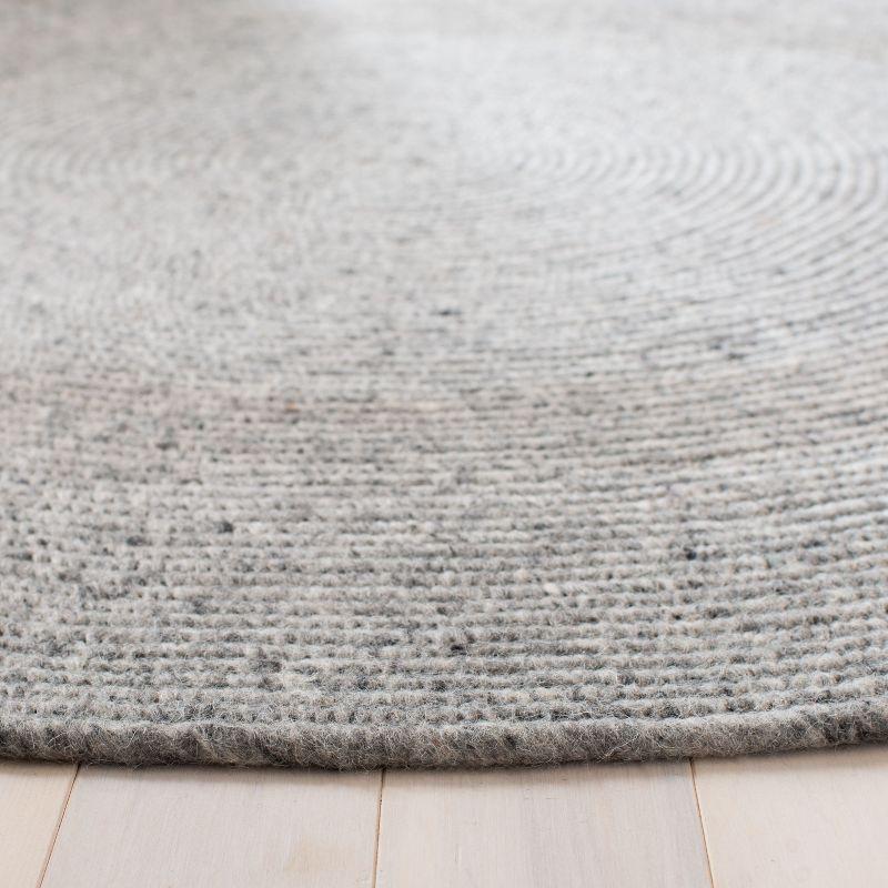 Handmade Light Gray Braided Wool Round Area Rug