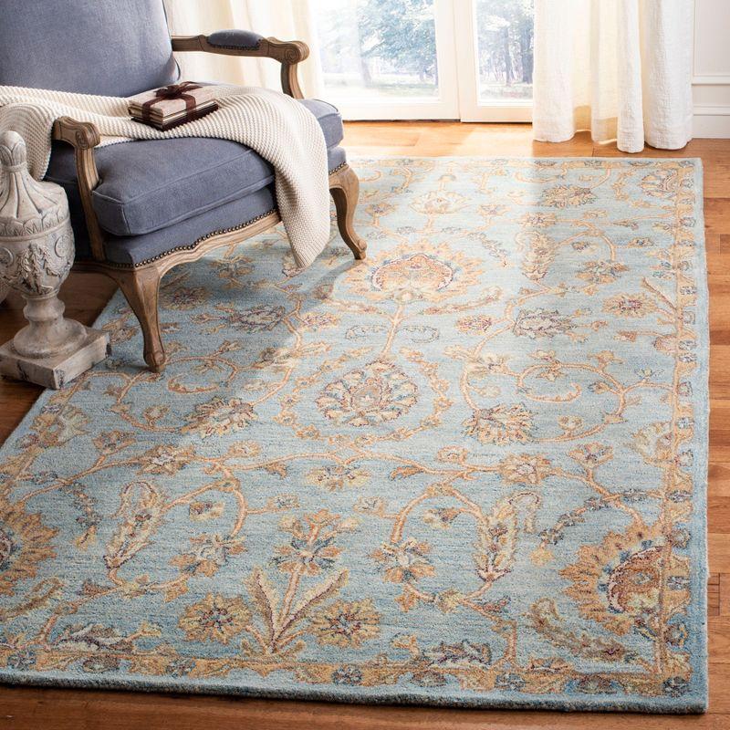 Elegant Heritage Hand-Tufted Light Blue Wool Rectangular Rug