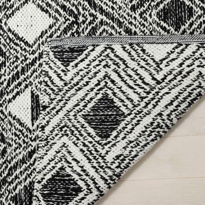 Montauk MTK614 Hand Woven Indoor Area Rug - Black/Ivory - 5'x8' - Safavieh.