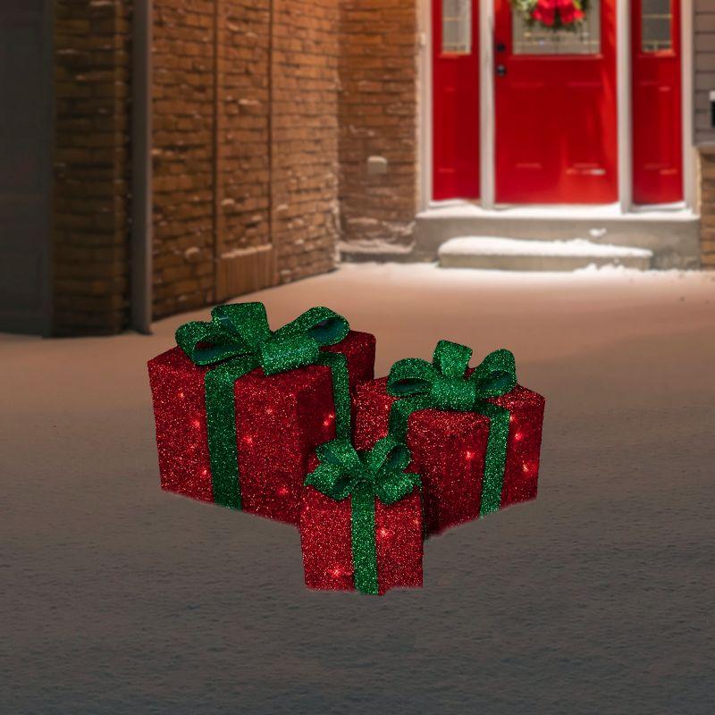 Northlight Seasonal Set of 3 Lighted Red and Green Tinsel Gift Boxes with Bows Christmas Outdoor Decorations 10"