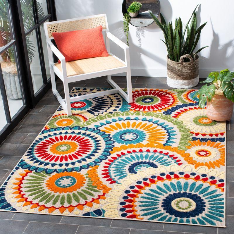 Blue and Ivory Floral Synthetic Indoor/Outdoor Rug