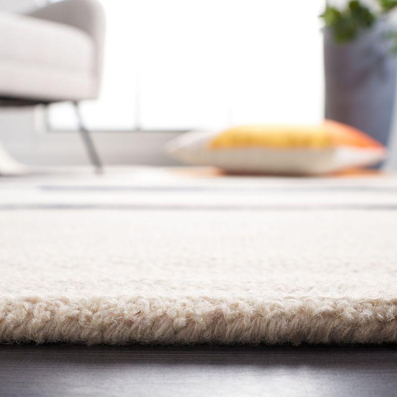 Rodeo Drive RD883 Hand Tufted Indoor Accent Rug - 4'x6' - Beige/Black - Safavieh