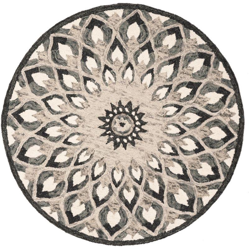 Novelty NOV603 Hand Tufted Area Rug - Charcoal/Ivory - 9' round - Safavieh.