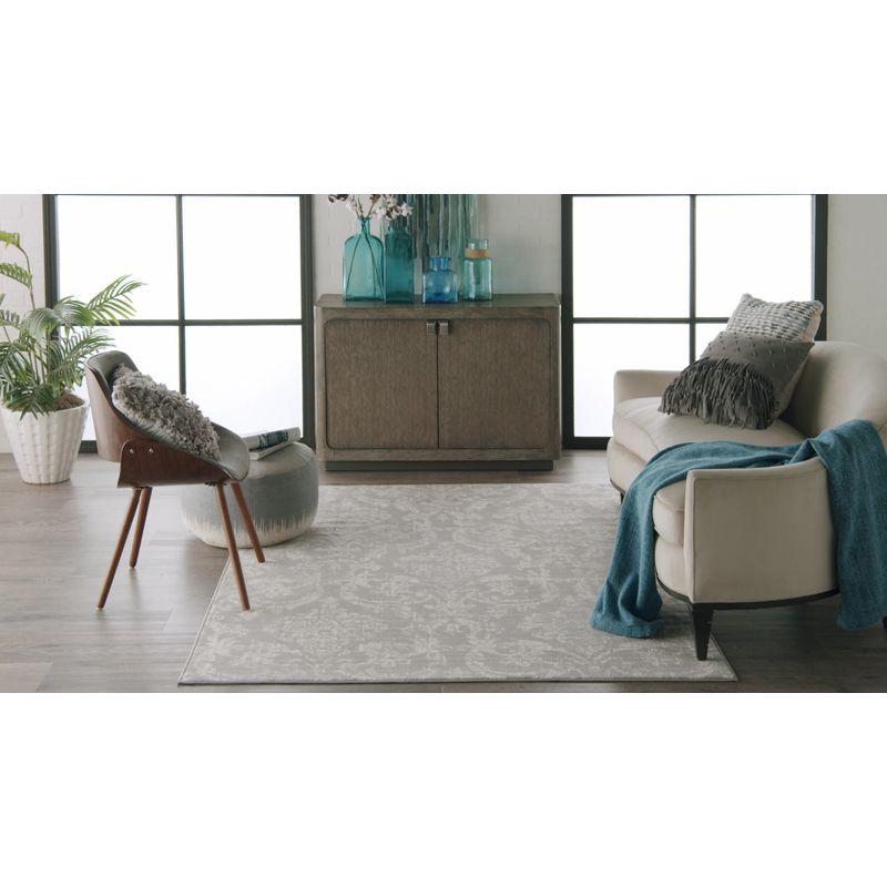 Ivory and Blue Distressed Damask 3' x 5' Area Rug