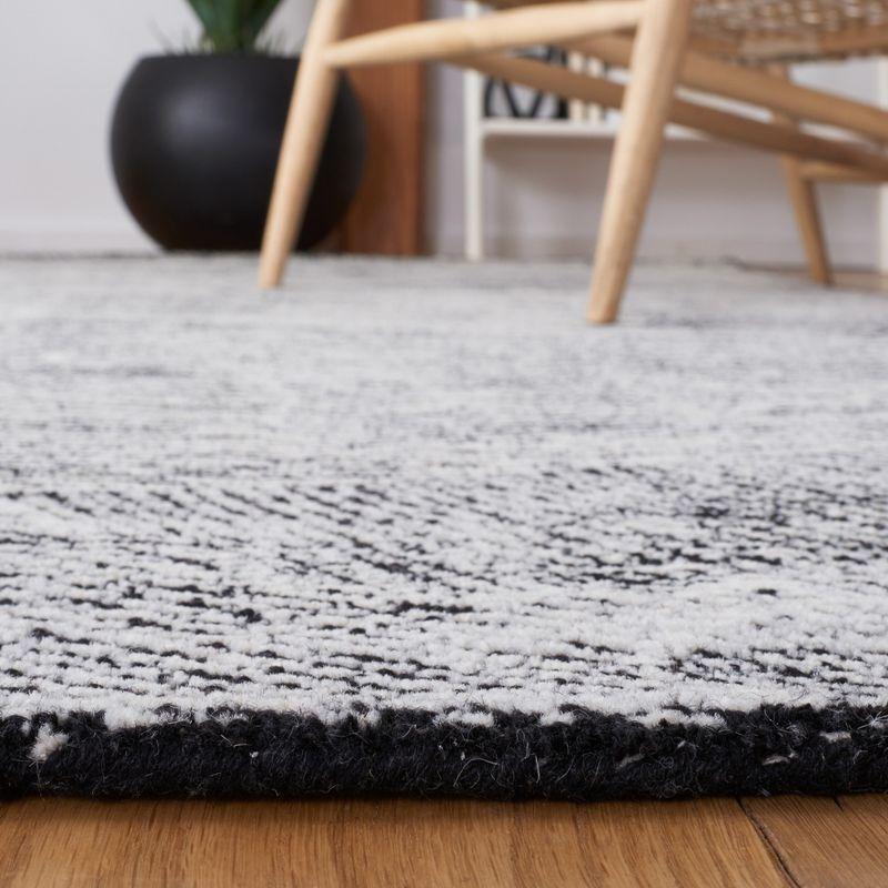 Handmade Black Wool Rectangular Tufted Area Rug