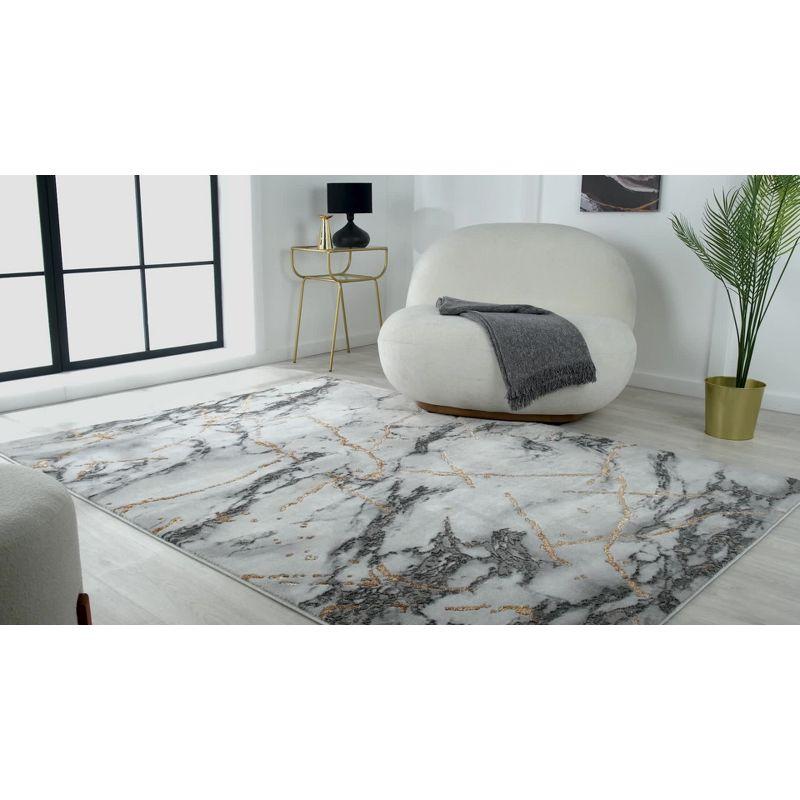 Ivory 5' x 7' Abstract Stain-Resistant Synthetic Area Rug