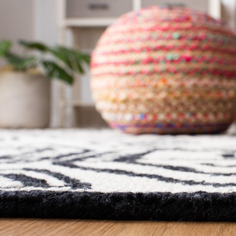 Metro MET404 Hand Tufted Area Rug - Black/Ivory - 8'x10' - Safavieh.