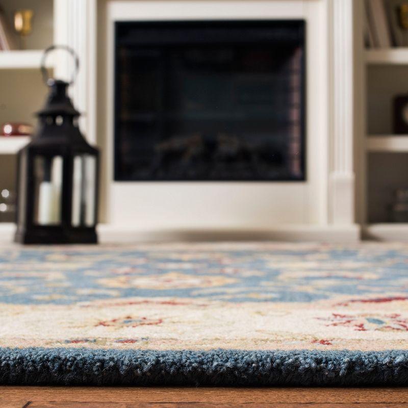 Antiquity Inspired Blue and Beige Handmade Wool Area Rug - 7'6" x 9'6"