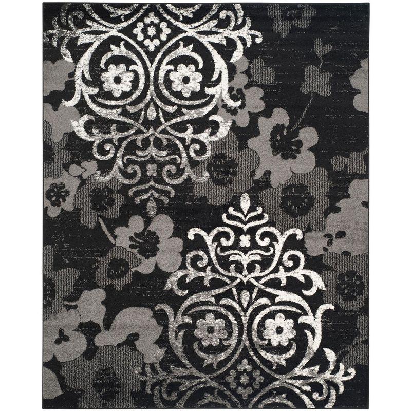 Elegant Black/Silver 9' x 12' Reversible Synthetic Area Rug