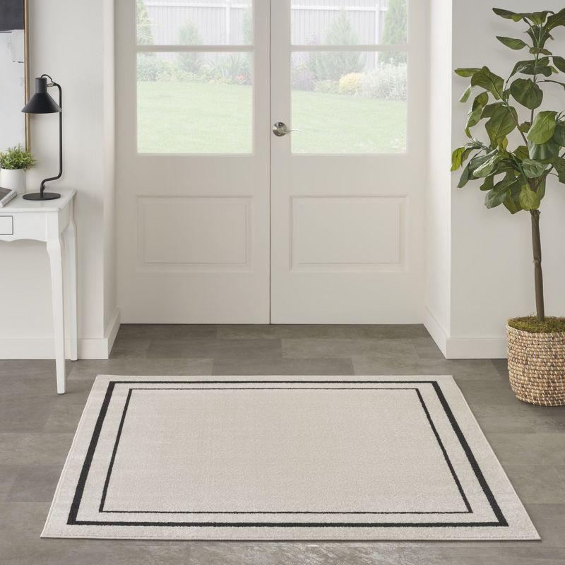 Nourison Essentials Bordered Indoor Outdoor Area Rug