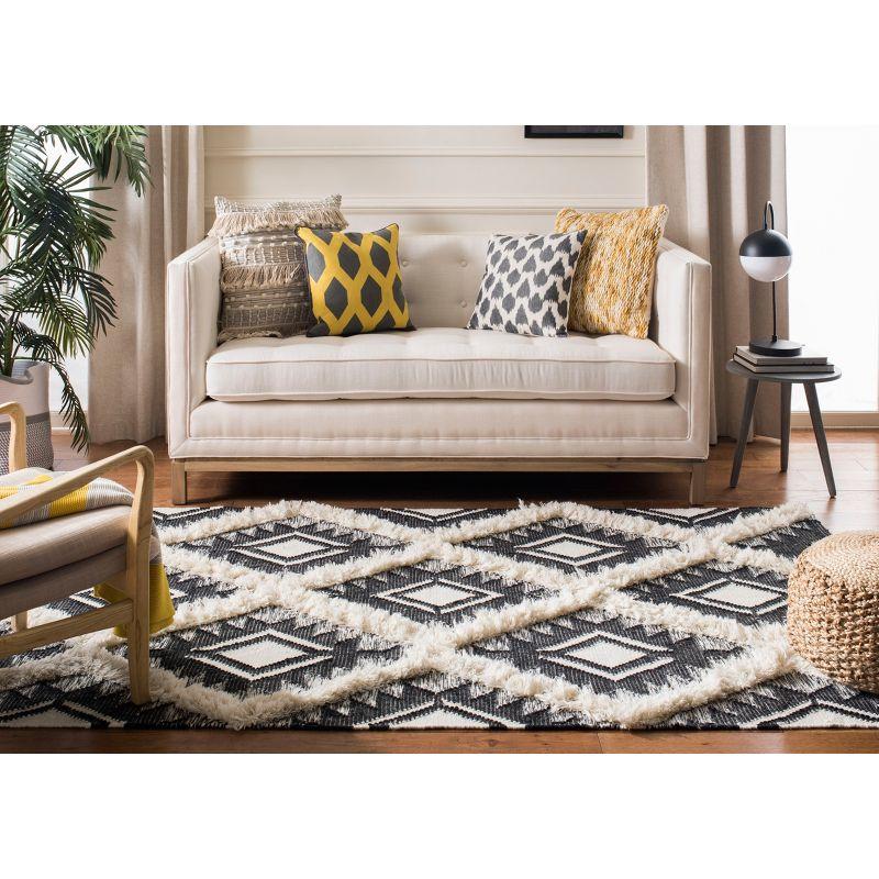 Handwoven Black and Ivory Wool Tribal Area Rug 6' x 9'