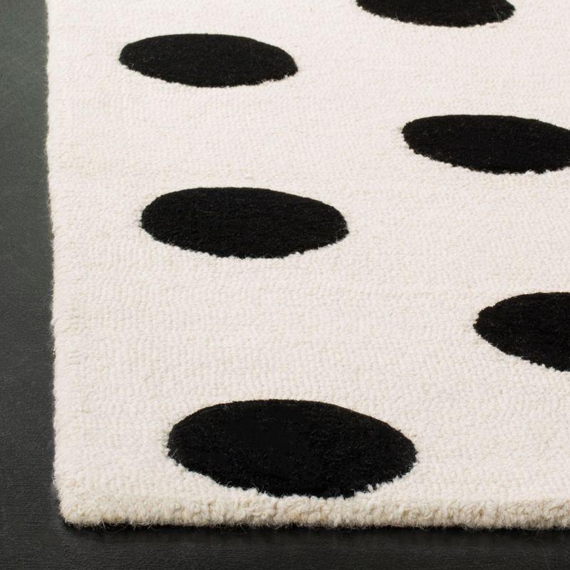 Safavieh Kids Polka Dots SFK904 Hand Tufted Indoor Area Rug - Ivory/Black - 5'x5' - Safavieh