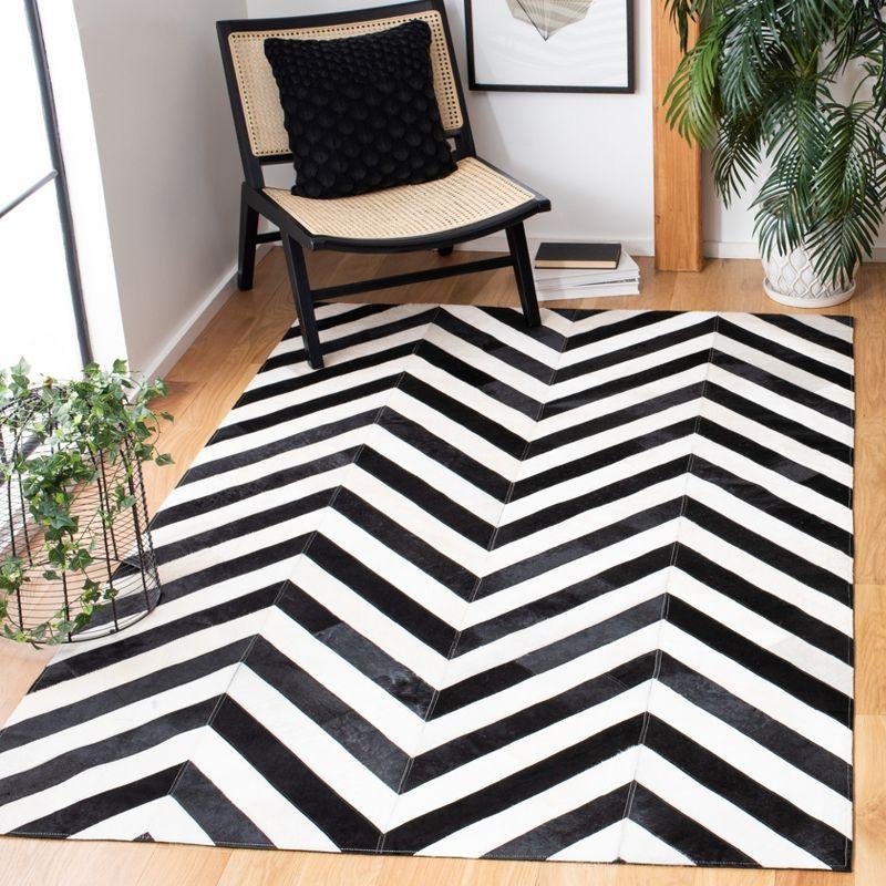 Handmade Black and White Geometric Cowhide Area Rug 4' x 6'